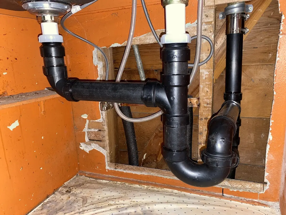 Professional Garbage Disposal Repair equipment and tools on the job in Burrell